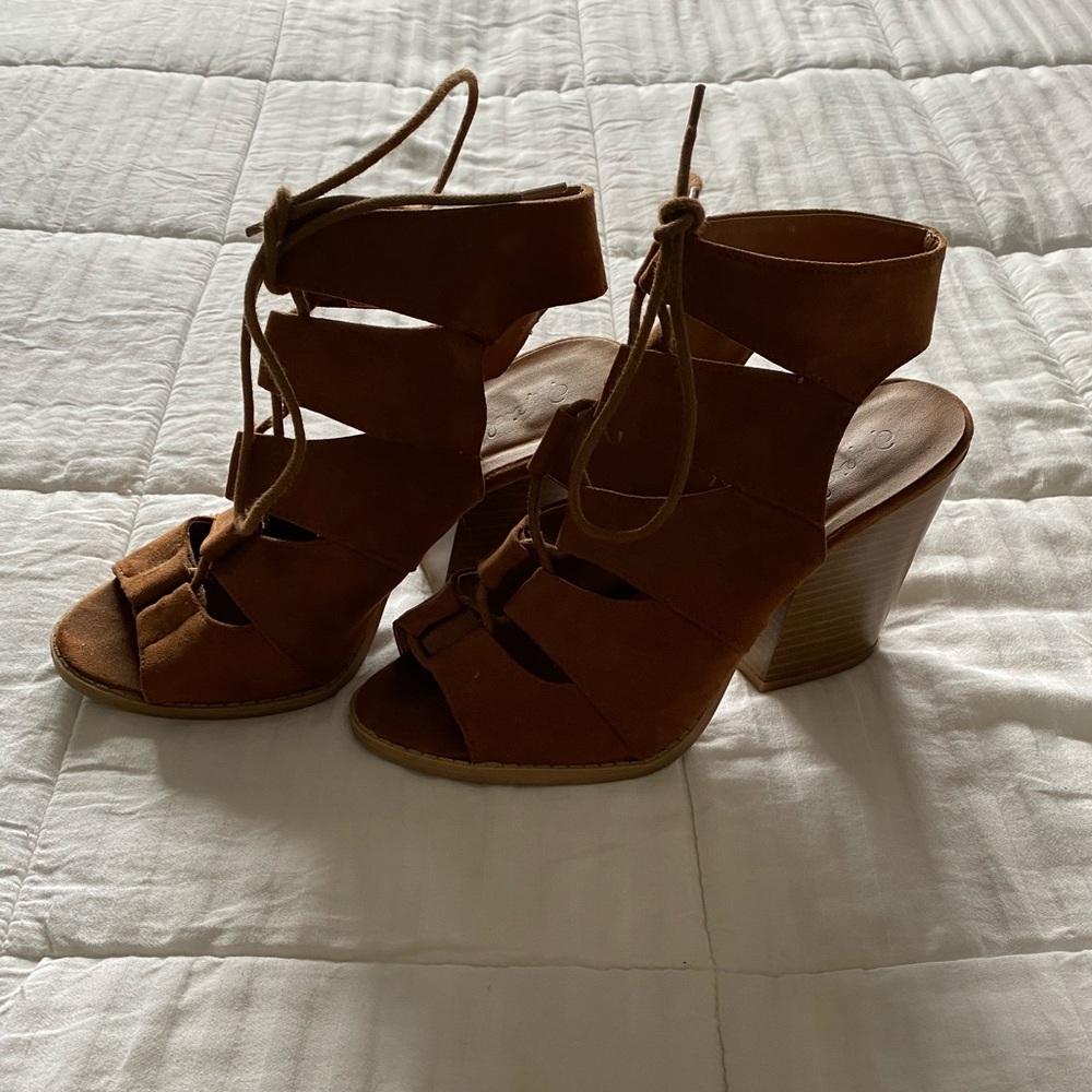 Fashion nova heeled open toe booties.